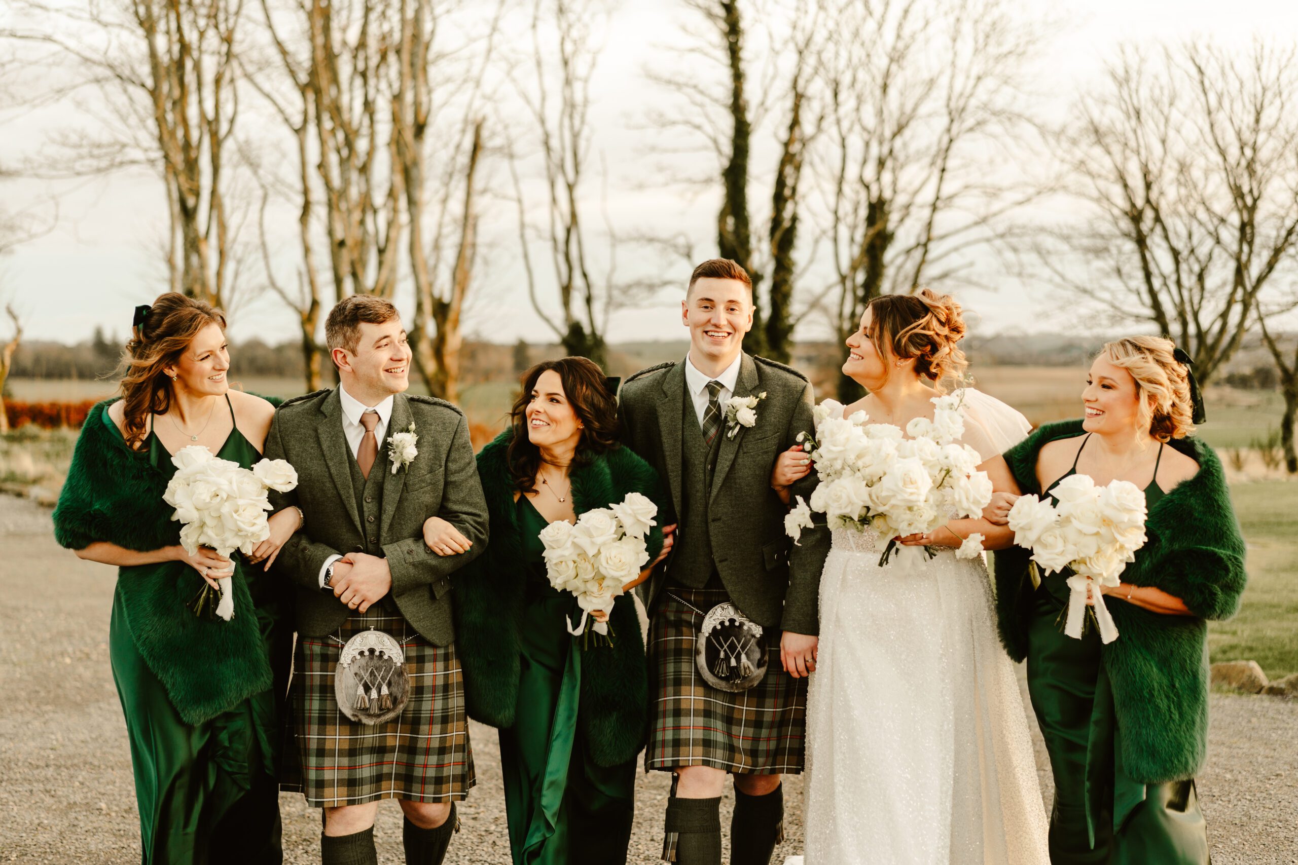 bridal party photo outside schivas steading